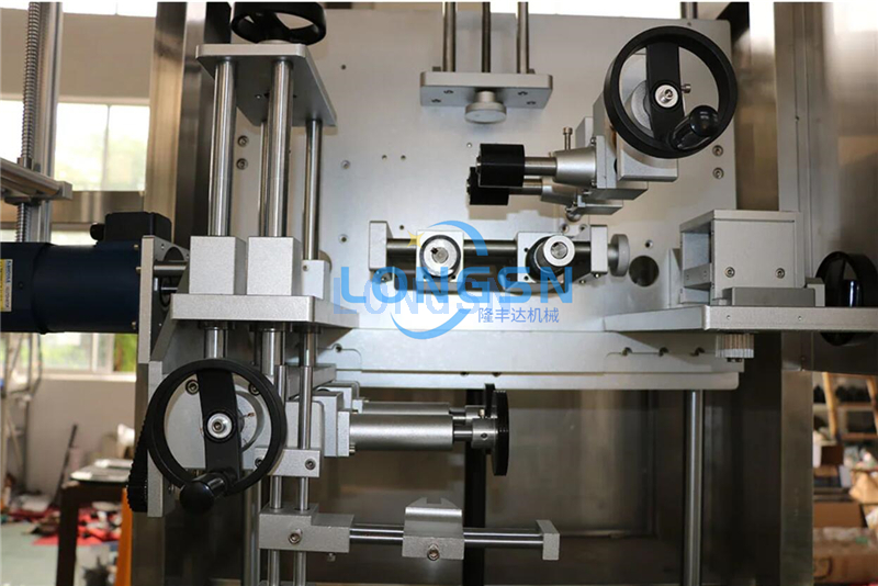 Αυτόματη μηχανή επισήμανσης μανικιών ετικετών τυλίγματος για στρογγυλό μπουκάλι